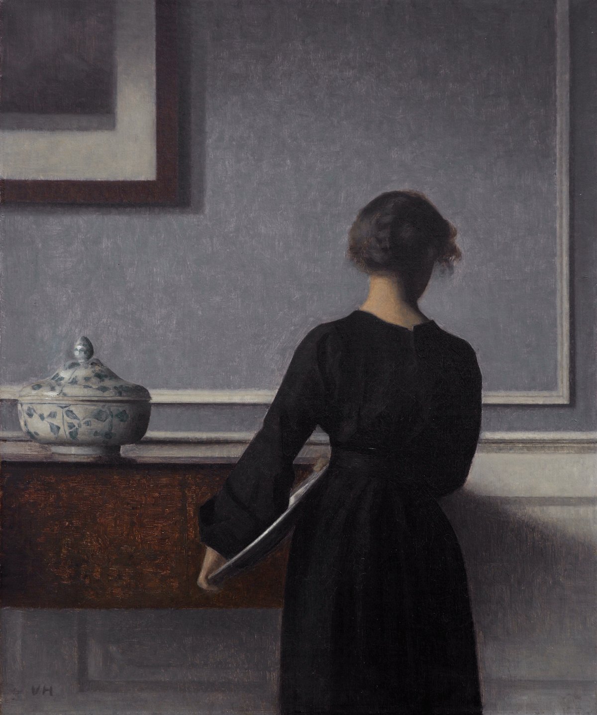 Vilhelm Hammershøi, Interior con mujer joven vista de espaldas